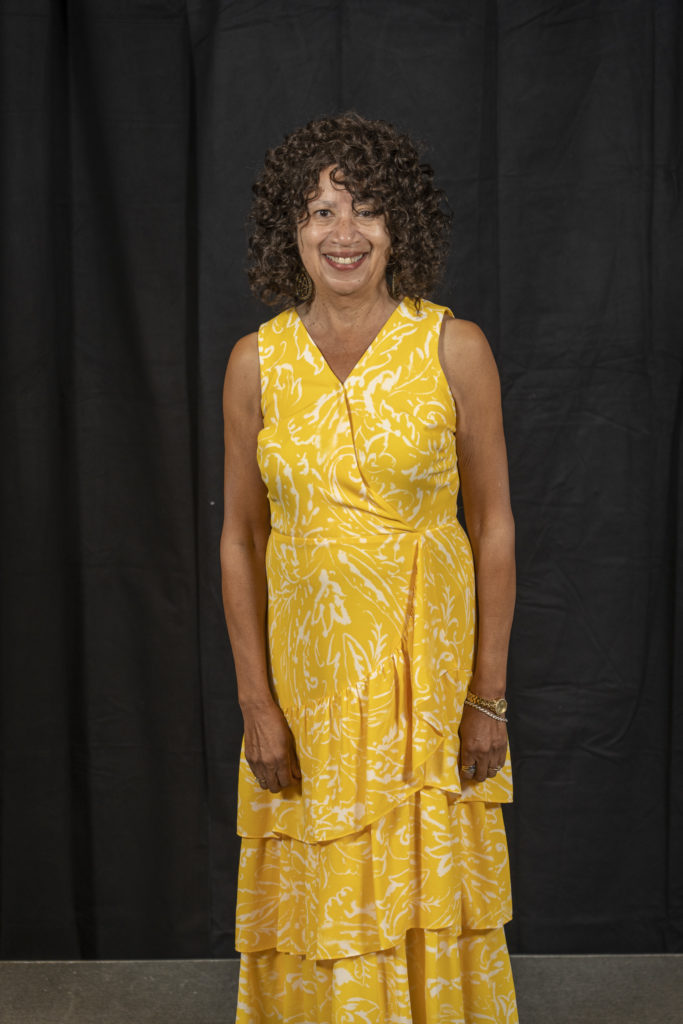 Kathey Avery giving Big Idea Talk on Real Help in Real Time Grows Flowers in Healthcare Cracks